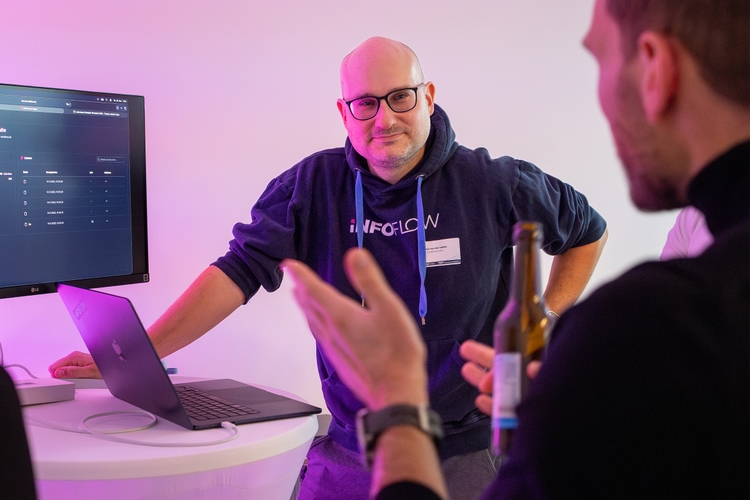 Me, Florian van der Galiën, at an event representing our product iNFOFLOW.